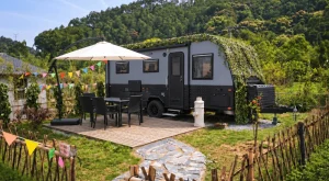 Caravan exterior storage ideas for wet gear with an exterior storage box at a campsite