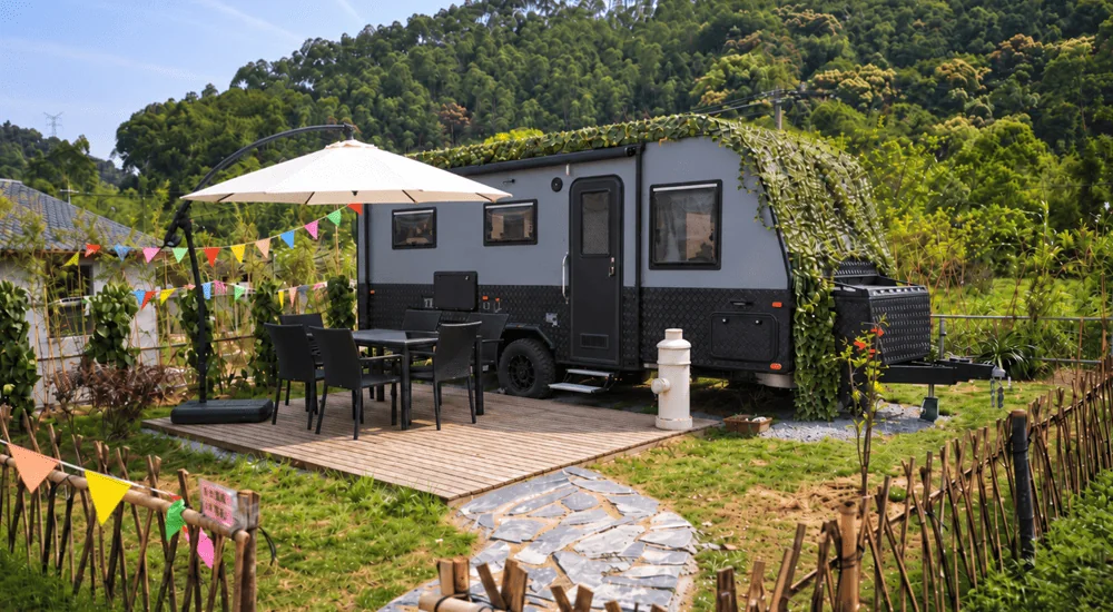 Caravan exterior storage ideas for wet gear with an exterior storage box at a campsite